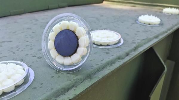 Dishes of Bird Free with magnets for fixing to metal surfaces